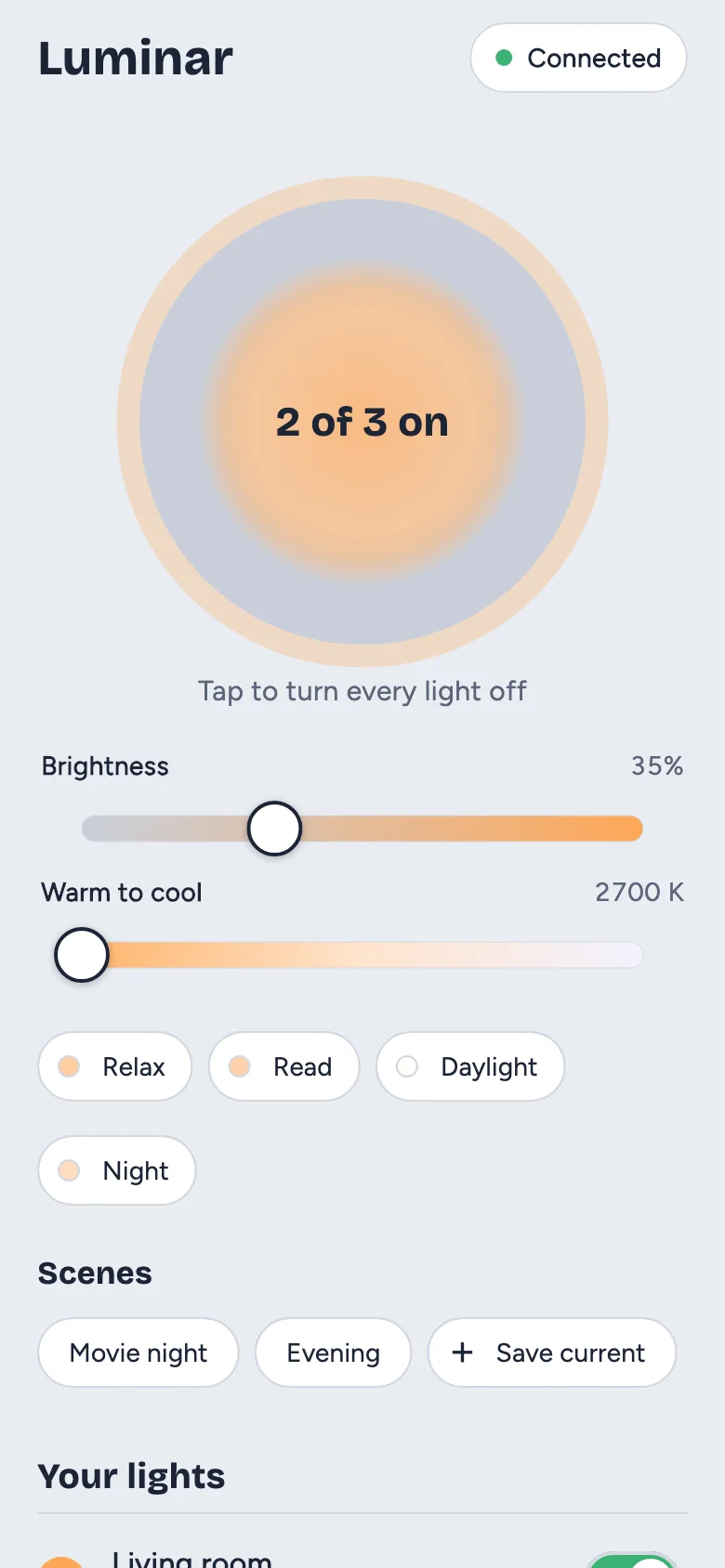 The home screen: a lamp button showing 2 of 3 lights on, brightness and warmth sliders, presets, and saved scenes.